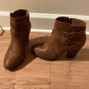 Brown booties with decorative double buckle